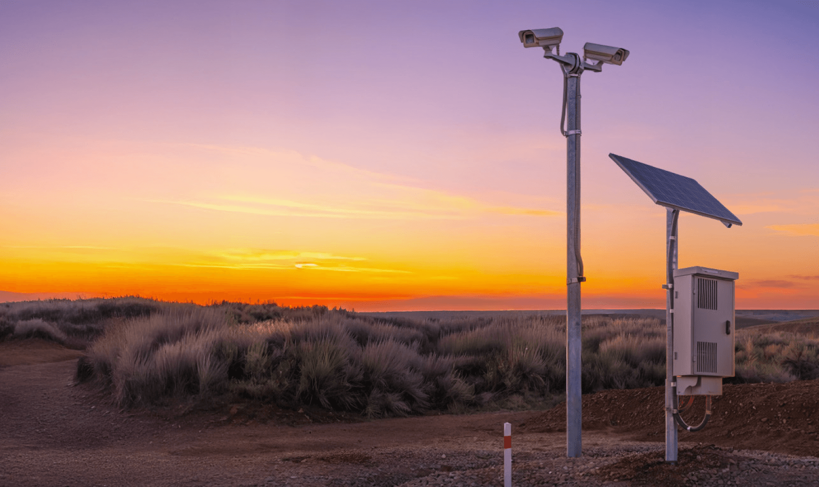 Solar-powered camera unit on a remote oil wellhead with no visible power lines