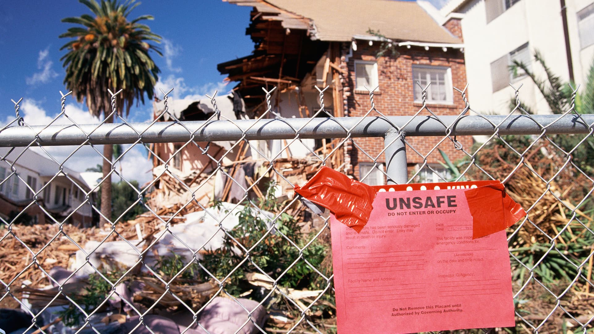 First responder deploying portable surveillance system at a disaster scene